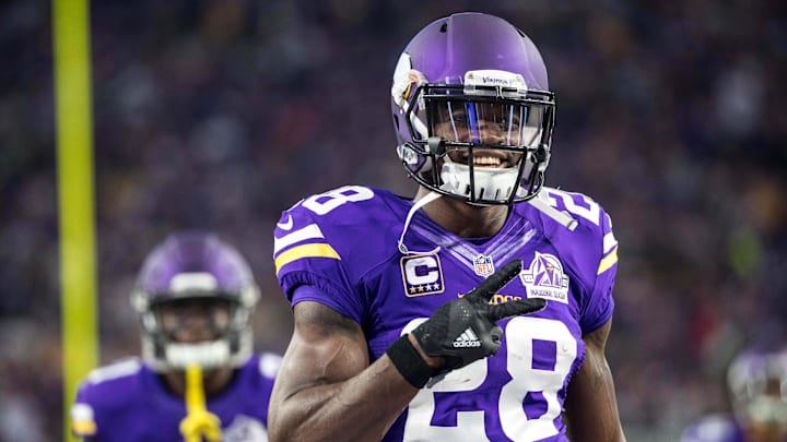 Minnesota Vikings running back Adrian Peterson smiles prior to the game against the Green Bay Packers.