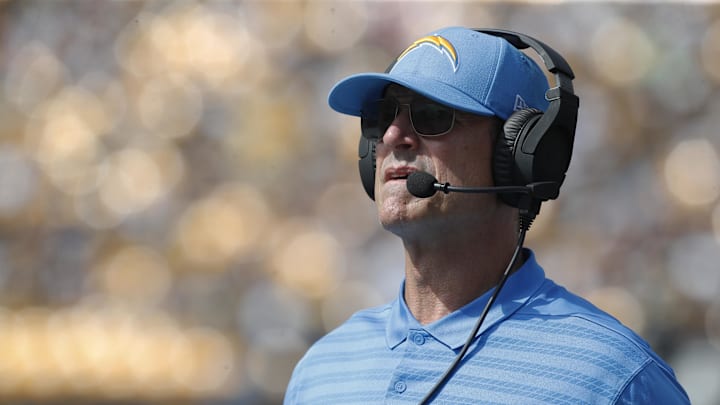 Sep 22, 2024; Pittsburgh, Pennsylvania, USA;  Los Angeles Chargers head coach Jim Harbaugh looks on from the sidelines during the second quarter against the Pittsburgh Steelers at Acrisure Stadium. Mandatory Credit: Charles LeClaire-Imagn Images