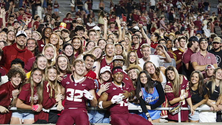 Florida State Seminoles wide receiver Jeremiah Giedrys (32) and defensive back Danj Altine (43).