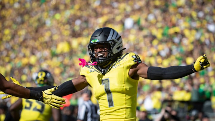 Oregon wide receiver Traeshon Holden celebrates a touchdown by Oregon wide receiver Justius Lowe as the No. 1 Oregon Ducks host the No. 21 Illinois Fighting Illini Saturday, Oct. 26, 2024 at Autzen Stadium in Eugene, Ore.