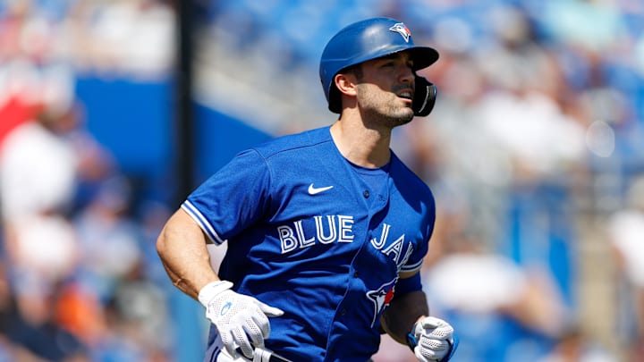 Toronto Blue Jays center fielder Randal Grichuk (15) runs the bases after hitting a grand slam in the fourth inning against the New York Yankees during spring training at TD Ballpark in 2022.