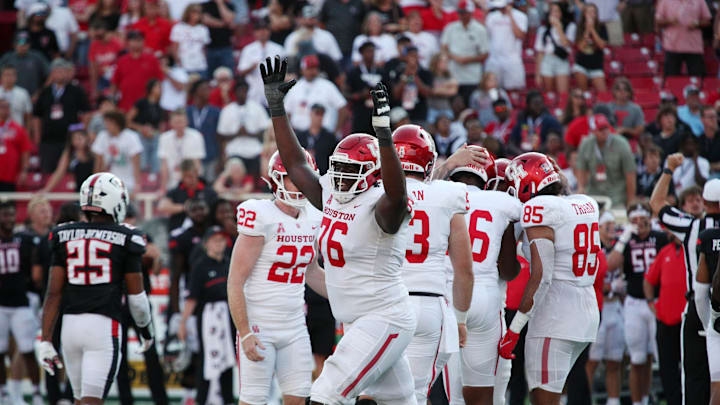 Sep 10, 2022; Lubbock, Texas, USA;  Houston Cougars offensive lineman Patrick Paul (76) reacts in the second half after a field goal against the Texas Tech Red Raiders at Jones AT&T Stadium and Cody Campbell Field. Mandatory Credit: Michael C. Johnson-Imagn Images