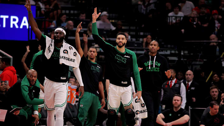 Jan 3, 2025; Houston, Texas, USA; Boston Celtics players on the bench react after a made basket by Boston Celtics guard Payton Pritchard (11, not shown) during the fourth quarter at Toyota Center. Mandatory Credit: Erik Williams-Imagn Images Jan 3, 2025; Houston, Texas, USA; Boston Celtics players on the bench react after a made basket by Boston Celtics guard Payton Pritchard (11, not shown) during the fourth quarter at Toyota Center. Mandatory Credit: Erik Williams-Imagn Images