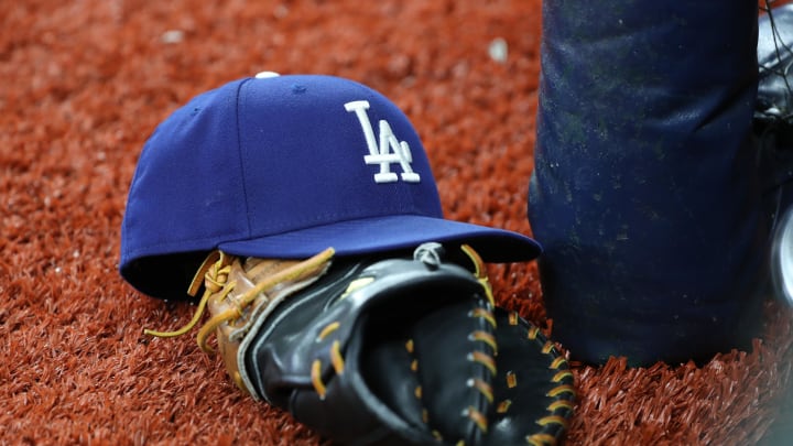 May 21, 2019; St. Petersburg, FL, USA; A detail view of Los Angeles Dodgers hat and glove at Tropicana Field. Mandatory Credit: Kim Klement-USA TODAY Sports