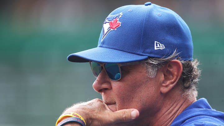 Aug 20, 2025; Pittsburgh, Pennsylvania, USA;  Toronto Blue Jays bench coach Don Mattingly (46) looks on from the dugout against the Pittsburgh Pirates during the fourth inning at PNC Park. Mandatory Credit: Charles LeClaire-Imagn Images