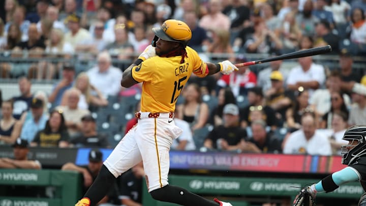 Jul 18, 2025; Pittsburgh, Pennsylvania, USA;  Pittsburgh Pirates center fielder Oneil Cruz (15) hits an RBI single against the Chicago White Sox during the fourth inning at PNC Park. Mandatory Credit: Charles LeClaire-Imagn Images
