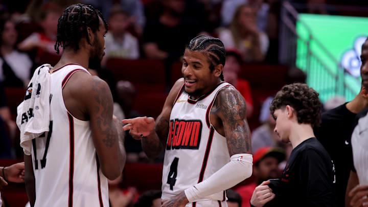 Apr 4, 2025; Houston, Texas, USA; Houston Rockets guard Jalen Green (4) is congratulated on the bench by Houston Rockets forward Tari Eason (17) during the fourth quarter against the Oklahoma City Thunder at Toyota Center. Mandatory Credit: Erik Williams-Imagn Images