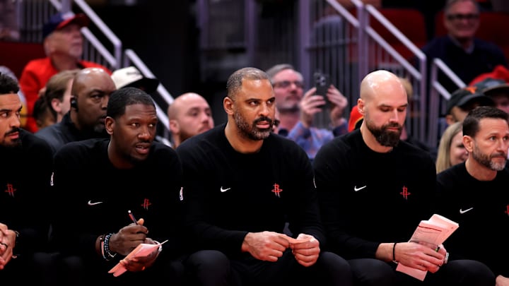 Jan 22, 2025; Houston, Texas, USA; Houston Rockets head coach Ime Udoka (center) on the bench against the Cleveland Cavaliers during the second quarter at Toyota Center. Mandatory Credit: Erik Williams-Imagn Images
