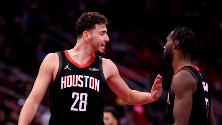 Nov 22, 2024; Houston, Texas, USA; Houston Rockets center Alperen Sengun (28) talks to forward Tari Eason (17) against the Portland Trailblazers during the third quarter at Toyota Center. Mandatory Credit: Erik Williams-Imagn Images