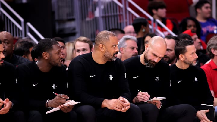 Nov 12, 2025; Houston, Texas, USA; Houston Rockets head coach Ime Udoka (center) on the bench against the Washington Wizards during the second quarter at Toyota Center. Mandatory Credit: Erik Williams-Imagn Images