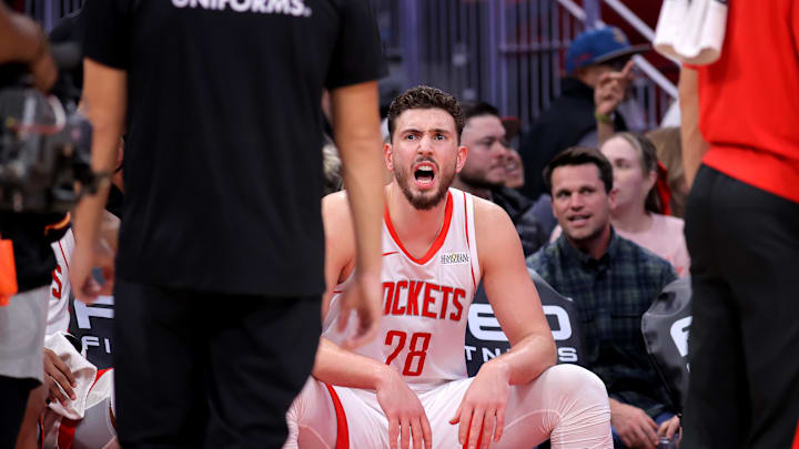 Feb 5, 2026; Houston, Texas, USA; Houston Rockets center Alperen Sengun (28) on the bench during a timeout against the Charlotte Hornets during the third quarter at Toyota Center. Mandatory Credit: Erik Williams-Imagn Images