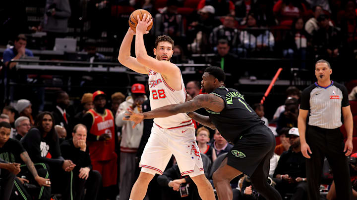 Jan 18, 2026; Houston, Texas, USA; Houston Rockets center Alperen Sengun (28) handles the ball against New Orleans Pelicans forward Zion Williamson (1) during the third quarter at Toyota Center. Mandatory Credit: Erik Williams-Imagn Images