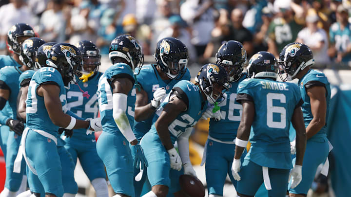 Oct 27, 2024; Jacksonville, Florida, USA; Jacksonville Jaguars cornerback Jarrian Jones (22), safety Antonio Johnson (26), cornerback Montaric Brown (30), safety Darnell Savage (6) and safety Andre Cisco (5) celebrate an interception against the Green Bay Packers during the second quarter at EverBank Stadium. Mandatory Credit: Morgan Tencza-Imagn Images Oct 27, 2024; Jacksonville, Florida, USA; Jacksonville Jaguars cornerback Jarrian Jones (22), safety Antonio Johnson (26), cornerback Montaric Brown (30), safety Darnell Savage (6) and safety Andre Cisco (5) celebrate an interception against the Green Bay Packers during the second quarter at EverBank Stadium. Mandatory Credit: Morgan Tencza-Imagn Images