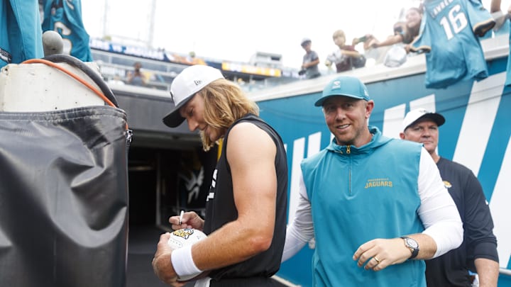 Aug 9, 2025; Jacksonville, Florida, USA;  Jacksonville Jaguars quarterback Trevor Lawrence (16) and head coach Liam Coen before the game against the Pittsburgh Steelers at EverBank Stadium. Mandatory Credit: Morgan Tencza-Imagn Images