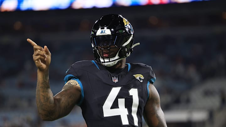 Jacksonville Jaguars linebacker Josh Allen (41) points to a familiar face before a regular season NFL football matchup Monday, Dec. 4, 2023 at EverBank Stadium in Jacksonville, Fla. [Corey Perrine/Florida Times-Union]