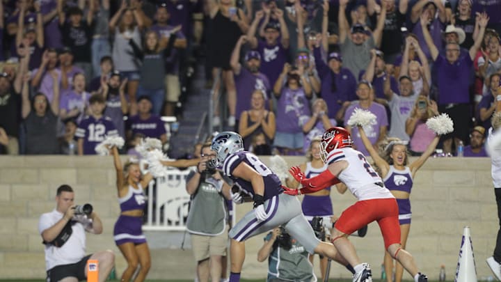 Kansas State Wildcats tight end Brayden Loftin (87) makes a touchdown during the third quarter of the game against Arizona at Bill Snyder Family Stadium on Friday, September 13, 2024. Kansas State Wildcats tight end Brayden Loftin (87) makes a touchdown during the third quarter of the game against Arizona at Bill Snyder Family Stadium on Friday, September 13, 2024.