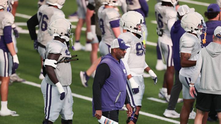 Kansas State defensive lineman coach Buddy Wyatt watches players warm up during practice on Tuesday, April 21, 2026.