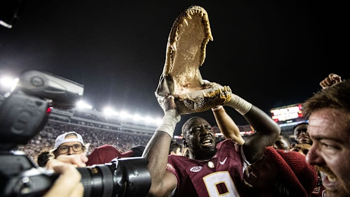 Members of the Florida State Seminoles football team and fans celebrate the team   s victory over the Florida Gators at Doak Campbell Stadium on Friday, Nov. 25, 2022.

Fsu V Uf Second Half1297