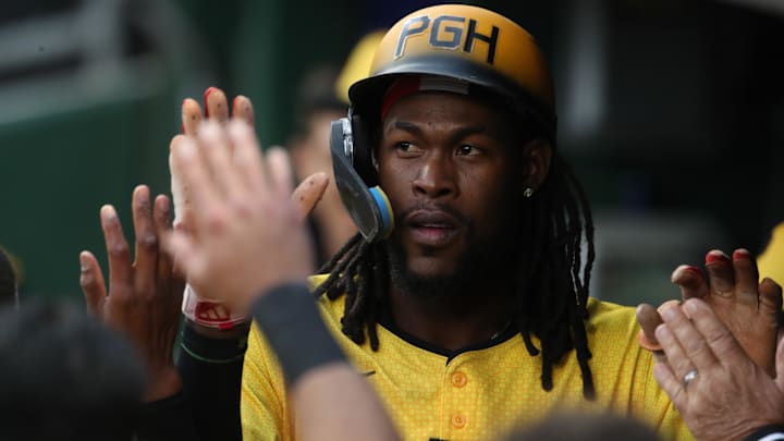 May 23, 2025; Pittsburgh, Pennsylvania, USA;  Pittsburgh Pirates center fielder Oneil Cruz (15) celebrates his solo home run in the dugout against the Milwaukee Brewers during the third inning at PNC Park. Mandatory Credit: Charles LeClaire-Imagn Images