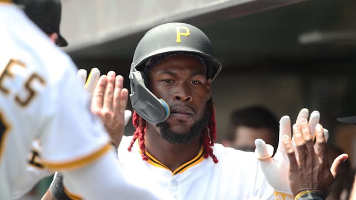 Jun 29, 2025; Pittsburgh, Pennsylvania, USA;  Pittsburgh Pirates center fielder Oneil Cruz (15) celebrates his two run home run in the dugout against the New York Mets during the first inning at PNC Park. Mandatory Credit: Charles LeClaire-Imagn Images