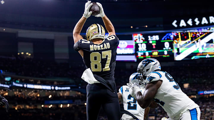 Sep 8, 2024; New Orleans, Louisiana, USA; New Orleans Saints tight end Foster Moreau (87) scores a touchdown against the Carolina Panthers during the first half at Caesars Superdome. Mandatory Credit: Stephen Lew-Imagn Images Sep 8, 2024; New Orleans, Louisiana, USA; New Orleans Saints tight end Foster Moreau (87) scores a touchdown against the Carolina Panthers during the first half at Caesars Superdome. Mandatory Credit: Stephen Lew-Imagn Images