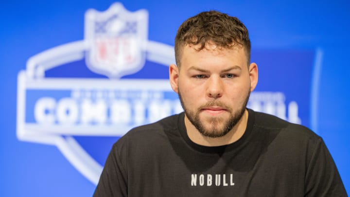 Feb 29, 2024; Indianapolis, IN, USA; Arizona tight end Tanner McLachlan (TE09) talks to the media