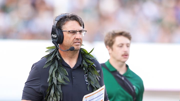 Brian Smith walks the sidelines against West Virginia.