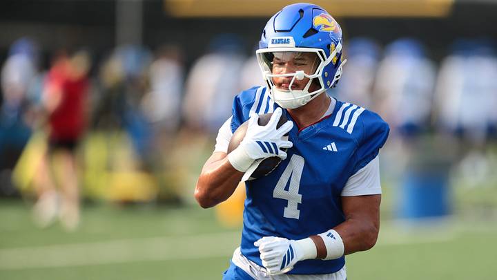 Kansas redshirt sophomore running back Jalen Dupree (4) makes a play during fall camp practice on Aug. 4, 2026.