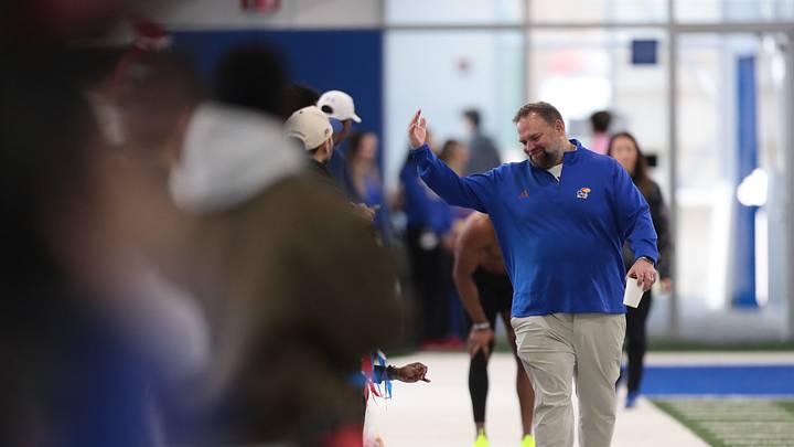 Kansas football associate head coach Andy Kotelnicki waves his hand during Pro Day at the University of Kansas on Wednesday, March 11, 2026. Kansas football associate head coach Andy Kotelnicki waves his hand during Pro Day at the University of Kansas on Wednesday, March 11, 2026.