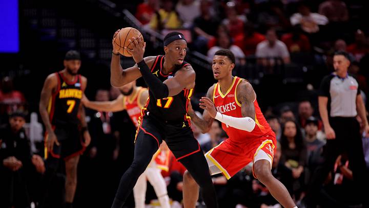 Oct 26, 2026; Houston, Texas, USA; Atlanta Hawks forward Onyeka Okongwu (17) handles the ball against Houston Rockets forward Jabari Smith Jr. (10) during the first quarter at Toyota Center. Mandatory Credit: Erik Williams-Imagn Images Oct 26, 2026; Houston, Texas, USA; Atlanta Hawks forward Onyeka Okongwu (17) handles the ball against Houston Rockets forward Jabari Smith Jr. (10) during the first quarter at Toyota Center. Mandatory Credit: Erik Williams-Imagn Images