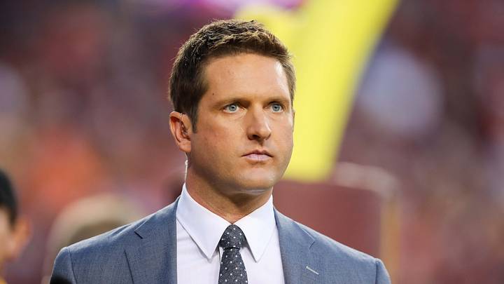 Former ESPN broadcaster Todd McShay walks on the sidelines before the game. Former ESPN broadcaster Todd McShay walks on the sidelines before the game.