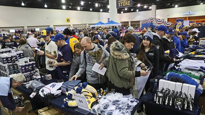 People shop for official Brewers merchandise during the Milwaukee Brewers annual Brewers On Deck fan event at the Wisconsin Center on Sunday.

Mjs Brewers27nws Sears 1