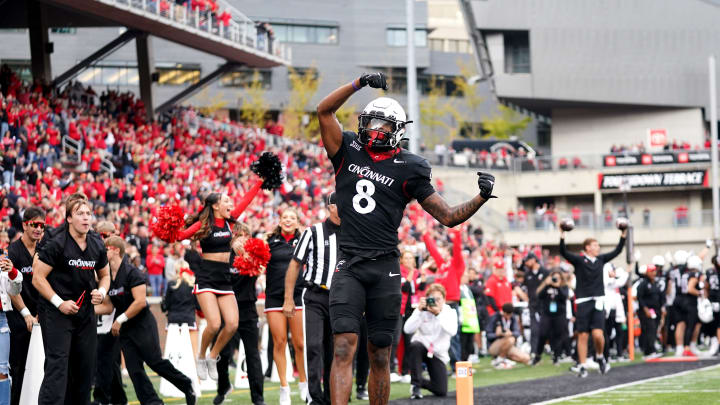 Cincinnati Bearcats wide receiver Xzavier Henderson (8) celebrates a touchdown catch against Baylor last Oct. 21 at Nippert Stadium.