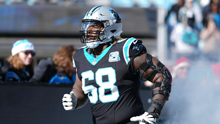 Dec 22, 2024; Charlotte, North Carolina, USA; Carolina Panthers guard Damien Lewis (68) takes the field during the first quarter against the Arizona Cardinals at Bank of America Stadium. Mandatory Credit: Jim Dedmon-Imagn Images Dec 22, 2024; Charlotte, North Carolina, USA; Carolina Panthers guard Damien Lewis (68) takes the field during the first quarter against the Arizona Cardinals at Bank of America Stadium. Mandatory Credit: Jim Dedmon-Imagn Images