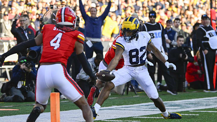 Nov 18, 2023; College Park, Maryland, USA; Michigan Wolverines wide receiver Semaj Morgan (82) scores a touchdown against the Maryland Terrapins during the second half at SECU Stadium. Mandatory Credit: Brad Mills-Imagn Images