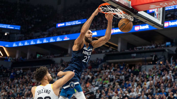 Minnesota Timberwolves center Rudy Gobert dunks over Utah Jazz guard Johnny Juzang in the second quarter at Target Center in Minneapolis on April 13, 2025. Minnesota Timberwolves center Rudy Gobert dunks over Utah Jazz guard Johnny Juzang in the second quarter at Target Center in Minneapolis on April 13, 2025.