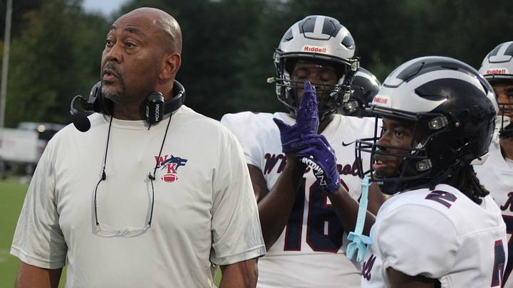 New White Knoll head football coach Victor Floyd watches as his team participates in its final scrimmage before opening the 2026 season against A.C. Flora.