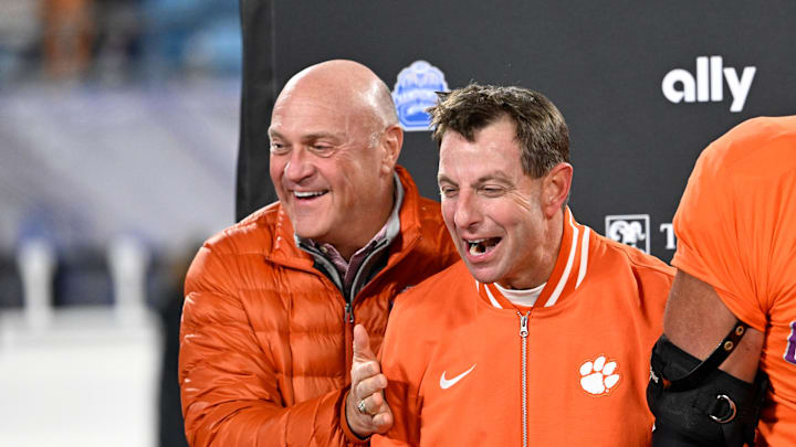 Dec 7, 2024; Charlotte, NC, USA; Clemson Tigers head coach Dabo Swinney with Clemson president Jim Clements after winning the 2024 ACC Championship game at Bank of America Stadium. Mandatory Credit: Bob Donnan-Imagn Images