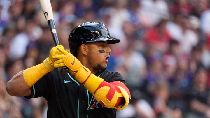 Apr 4, 2026; Phoenix, Arizona, USA; Arizona Diamondbacks catcher Gabriel Moreno (14) at bat in the second inning of a game against the Atlanta Braves at Chase Field. Mandatory Credit: Allan Henry-Imagn Images
