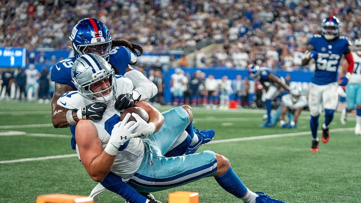 New York Giants linebacker Tremaine Edmunds (49) stops Dallas Cowboys tight end Jake Ferguson (87) at the goal line during a week one opening game between the New York Giants and Dallas Cowboys at Metlife Stadium on Sunday, Sept. 13, 2026, in East Rutherford, NJ. New York Giants linebacker Tremaine Edmunds (49) stops Dallas Cowboys tight end Jake Ferguson (87) at the goal line during a week one opening game between the New York Giants and Dallas Cowboys at Metlife Stadium on Sunday, Sept. 13, 2026, in East Rutherford, NJ.