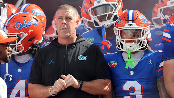 Sep 6, 2025; Gainesville, Florida, USA; Florida Gators head coach Billy Napier and teammates run out of the tunnel prior to the game against the South Florida Bulls at Ben Hill Griffin Stadium. Mandatory Credit: Kim Klement Neitzel-Imagn Images