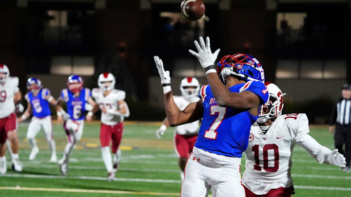 Bixby's Braeden Presley catches a touchdown pass in front of Owasso's Jaylon Moll during the Class 6A-I state football championship game between Owasso and Bixby at Chad Richison Stadium in Edmond, Okla., Friday, Dec. 6, 2024. Bixby's Braeden Presley catches a touchdown pass in front of Owasso's Jaylon Moll during the Class 6A-I state football championship game between Owasso and Bixby at Chad Richison Stadium in Edmond, Okla., Friday, Dec. 6, 2024.
