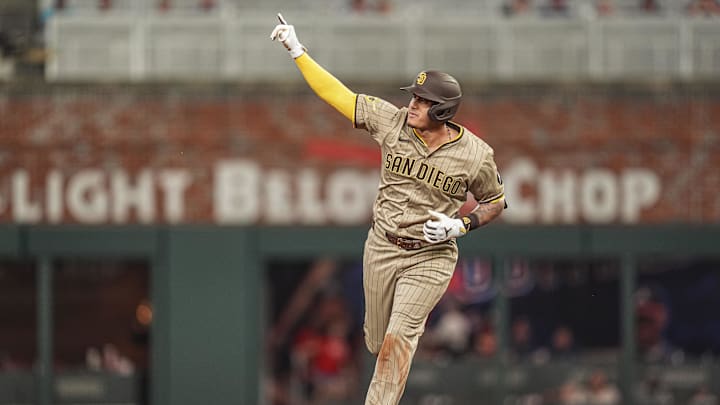 May 23, 2025; Cumberland, Georgia, USA; San Diego Padres third baseman Manny Machado (13) reacts after hitting a go ahead home run against the Atlanta Braves during the ninth inning at Truist Park. Mandatory Credit: Dale Zanine-Imagn Images May 23, 2025; Cumberland, Georgia, USA; San Diego Padres third baseman Manny Machado (13) reacts after hitting a go ahead home run against the Atlanta Braves during the ninth inning at Truist Park. Mandatory Credit: Dale Zanine-Imagn Images