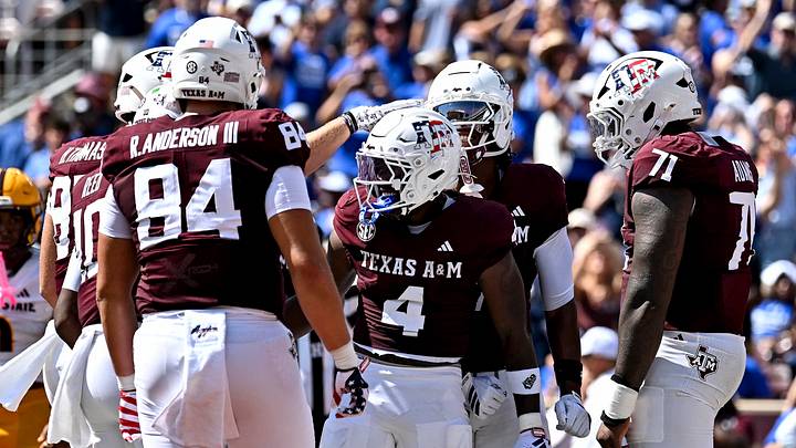 Sep 12, 2026; College Station, Texas, USA; Texas A&M Aggies running back Rueben Owens II (4) celebrates with teammates after scoring a touchdown against Arizona State Sun Devils during the first half at Kyle Field. Mandatory Credit: Maria Lysaker-Imagn Images