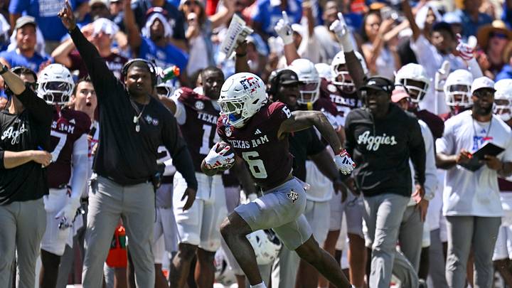 Sep 12, 2026; College Station, Texas, USA; Texas A&M Aggies cornerback Julio Humphrey (6) scores a touchdown on after intercepting the ball during the fourth quarter against Arizona State Sun Devils at Kyle Field. Mandatory Credit: Maria Lysaker-Imagn Images