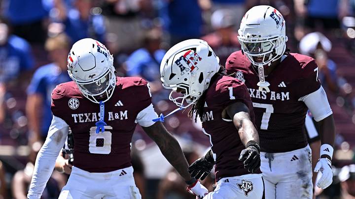 Texas A&M Aggies wide receiver Mario Craver (1) celebrates after scoring a touchdown with wide receiver Terry Bussey (6), and wide receiver Isaiah Horton (7) against Arizona State Sun Devils at Kyle Field Texas A&M Aggies wide receiver Mario Craver (1) celebrates after scoring a touchdown with wide receiver Terry Bussey (6), and wide receiver Isaiah Horton (7) against Arizona State Sun Devils at Kyle Field