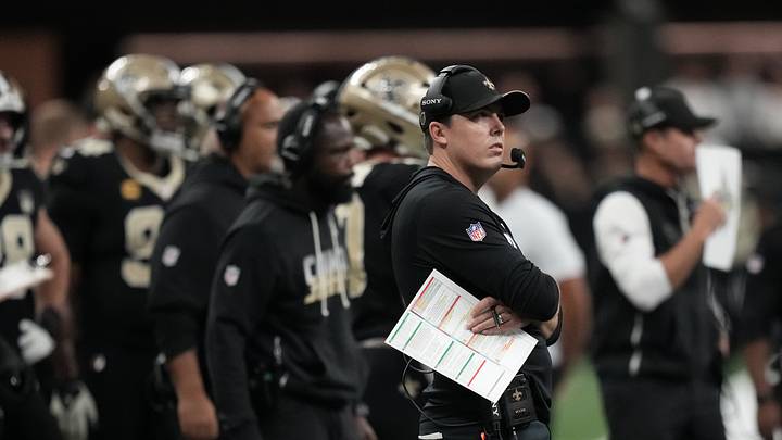 Sep 27, 2026; New Orleans, Louisiana, USA; New Orleans Saints head coach Kellen Moore looks on in the first quarter against the Las Vegas Raiders at Caesars Superdome. Mandatory Credit: Matthew Hinton-Imagn Images Sep 27, 2026; New Orleans, Louisiana, USA; New Orleans Saints head coach Kellen Moore looks on in the first quarter against the Las Vegas Raiders at Caesars Superdome. Mandatory Credit: Matthew Hinton-Imagn Images