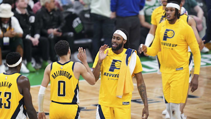 May 21, 2024; Boston, Massachusetts, USA; Indiana Pacers guard Tyrese Haliburton (0) and teammates react after his three point basket against the Boston Celtics in the third quarter during game one of the eastern conference finals for the 2024 NBA playoffs at TD Garden. Mandatory Credit: David Butler II-USA TODAY Sports
