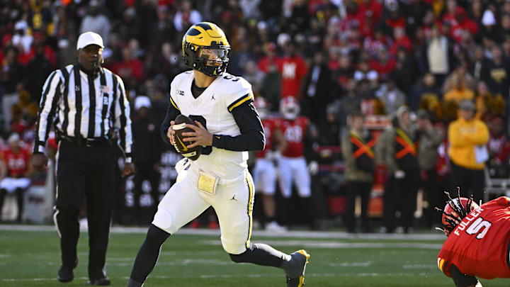 Nov 18, 2023; College Park, Maryland, USA; Michigan Wolverines quarterback J.J. McCarthy (9)