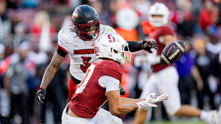 Nov 16, 2024; Stanford, California, USA;  Stanford Cardinal wide receiver Emmett Mosley V (10) catches a touchdown pass against the Louisville Cardinals during the fourth quarter at Stanford Stadium. Mandatory Credit: Bob Kupbens-Imagn Images